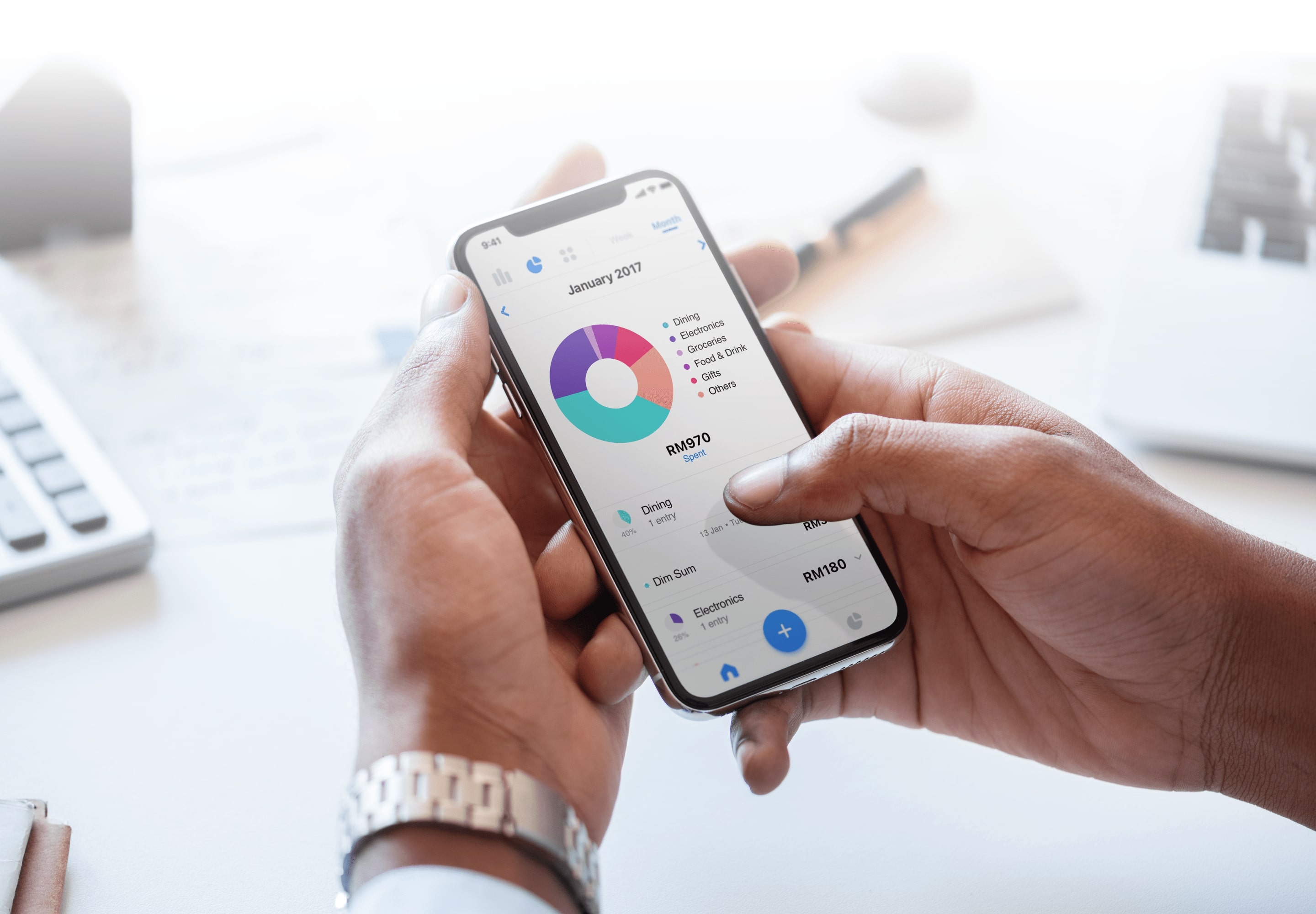 Saved app monthly spending overview showing pie chart with spending categories and total amount spent